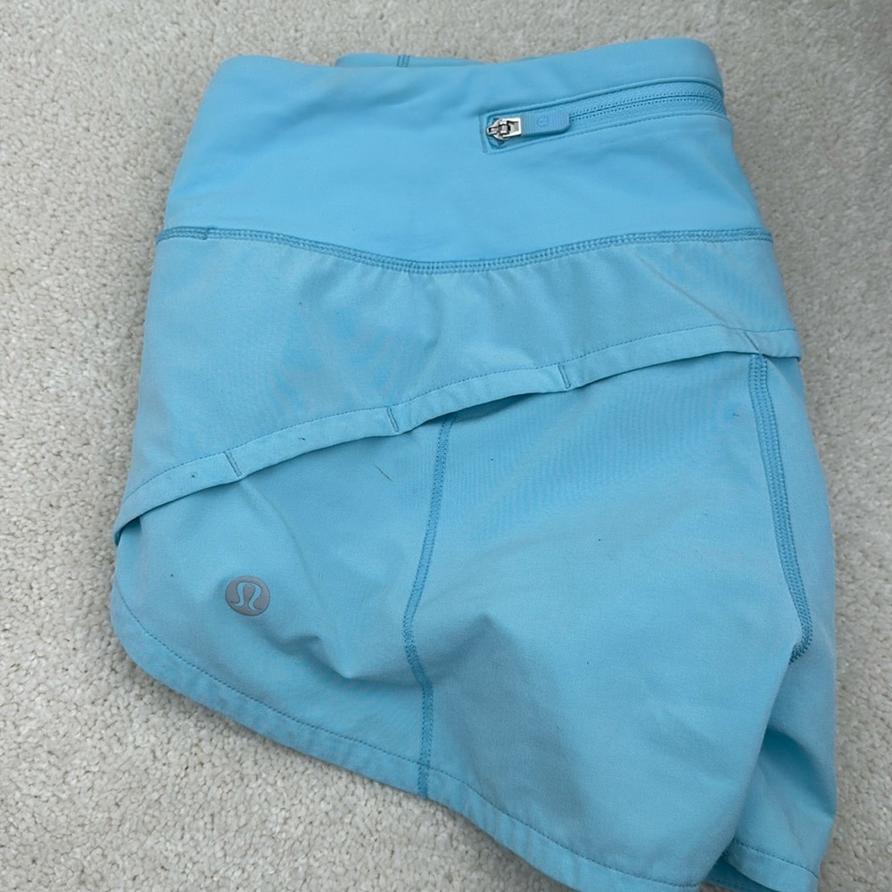 Turquoise blue lululemon speed up shorts 2.5